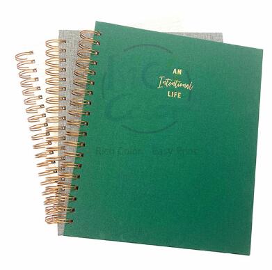 What Are the Common Binding Options Available for Cloth-Covered Planners?